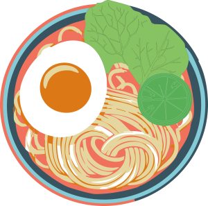 bowl of ramen with egg, lime and greens